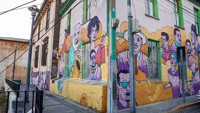 people's faces in a mural in valparaiso